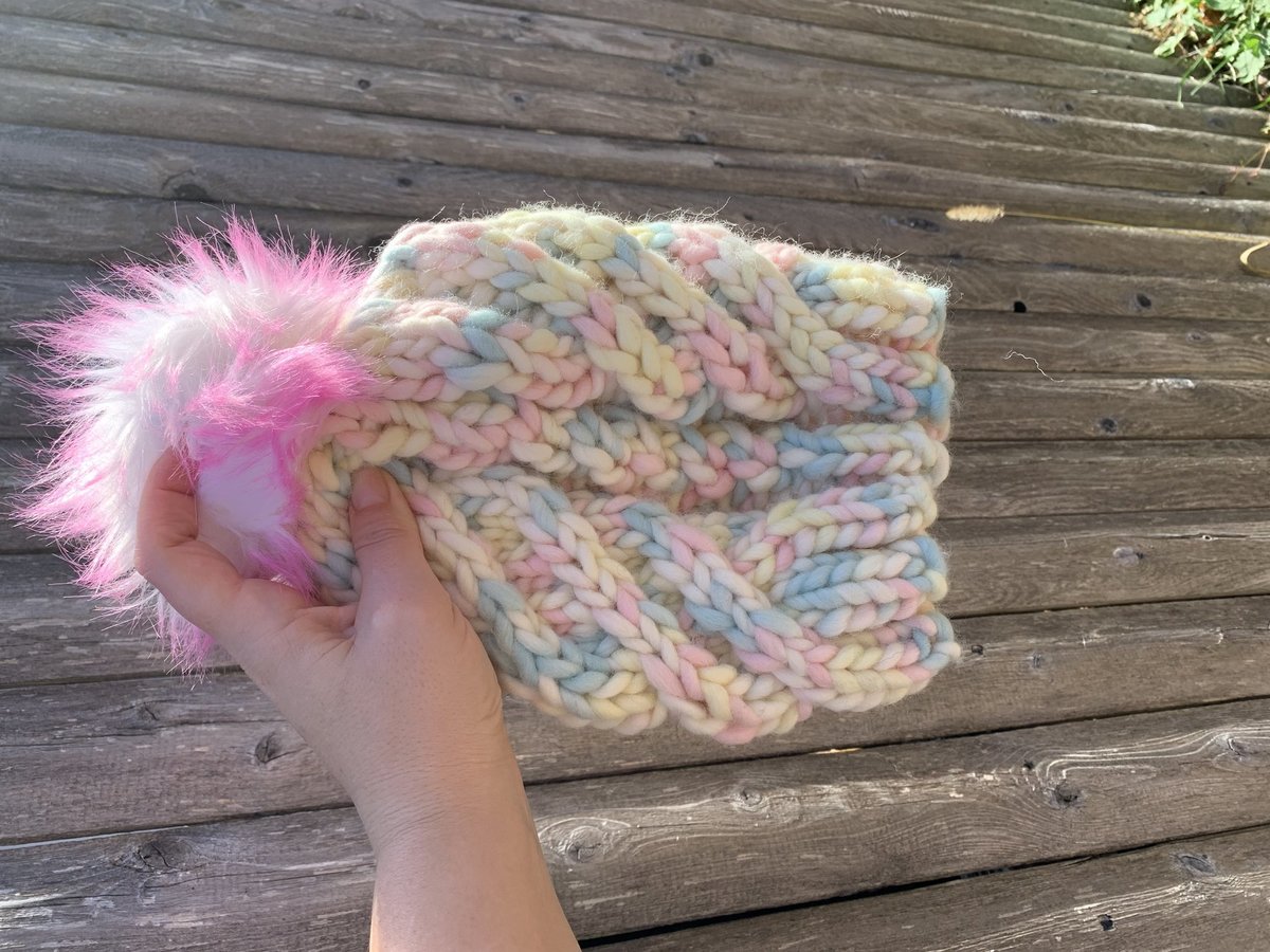 Unicorn hat with pom pom